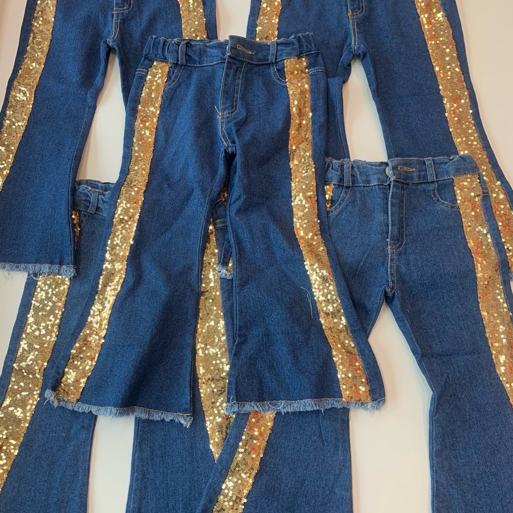Girl’s Jeans with gold glitter stripe, $10.00 each